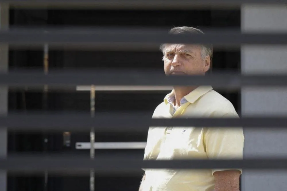 Jair Bolsonaro, líder da organização criminosa na trama golpista, foi condenado a 27 anos e 3 meses de prisão | Crédito: Foto: Sergio Lima/AFP